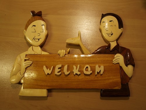 Curiosa - houten welkomsbord sw (39K)